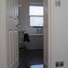 picture of a bathroom with slate floor created by the conversion of a loft in putney, south west london